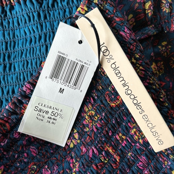 Aqua smocked waist floral, fully lined mini skirt, in size Medium, NWT - Picture 4 of 4